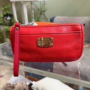 Michael Kors red pebbled leather wristlet bag with gold-tone hardware